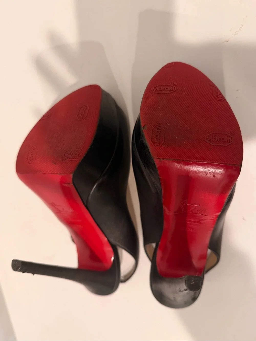 Christian Louboutin Black Leather Peep-Toe Slingback Pumps with Red Soles